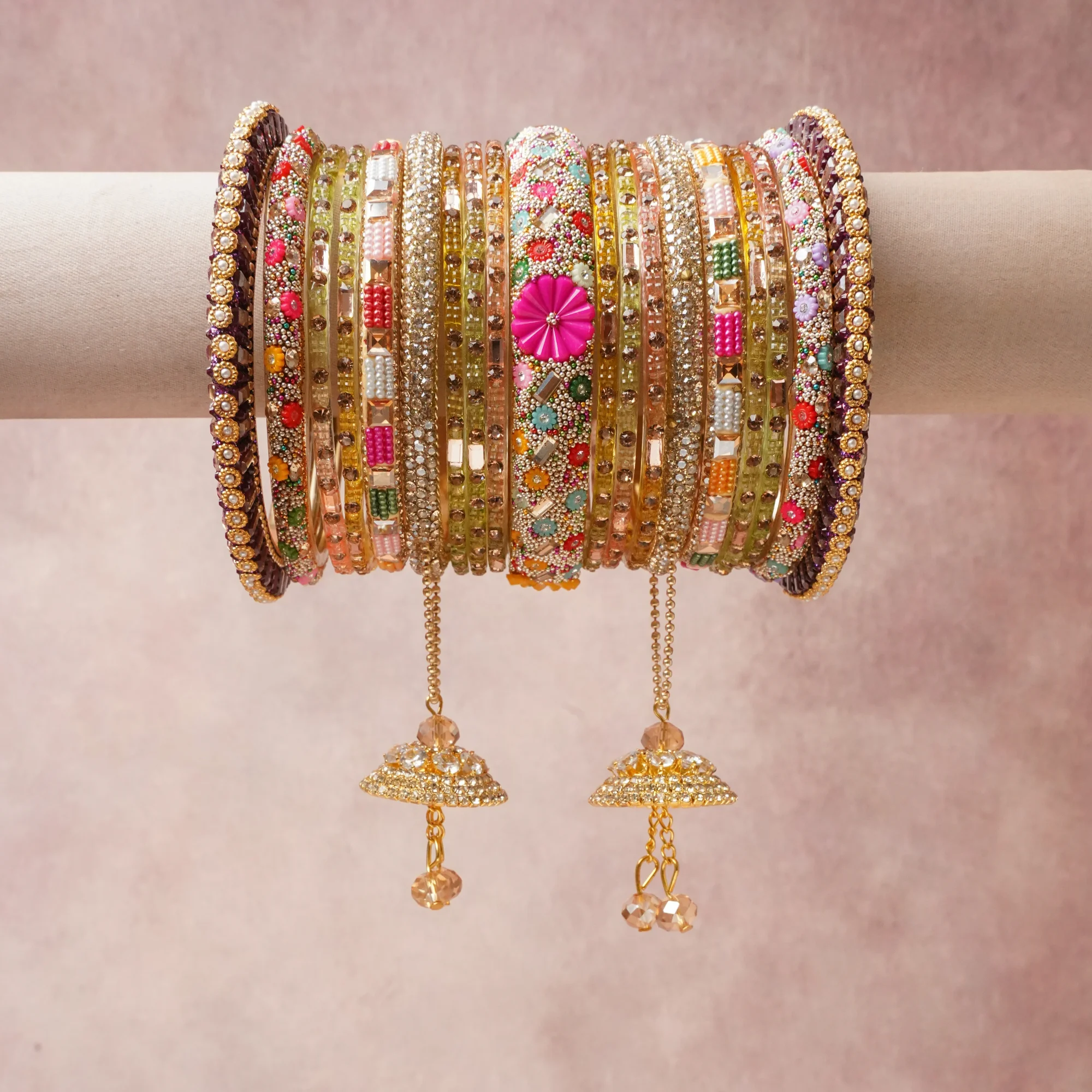 A majestic Multi colour set, complemented by Deep Magenta, Emerald Green, Crimson Red, Vivid Orange, Sky Blue, Lavender Purple, Champagne Beige, Metallic Gold, Metallic Silver, Pearl White featuring Glass, Gold-Toned Metal, Crystal Rhinestones, Glass Seed Beads, Enamel.
Rich, ceremonial, and designed to be passed through generations.